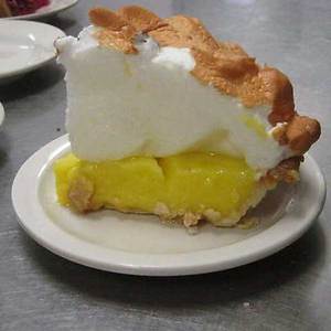 a slice of delicious lemon pie
